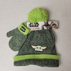 Baby Yoda Boys 2-Piece Beanie Style Hat & Mittens Set. Features The Favorite Baby Yoda Character On The Grren/Black Knit Fronts And A Green Pom-Pom On Top Of Hat, Size 2t-5t, Unstretched Hat Inside Rim Measures 7" And Top To Bottom Is 8", Mittens Measure Wrist At 2" And 5" Top To Bottom, Made In China, New, Unused Condition. Reasonable Offers Considered. Thanks For Taking A Look! Knitted Baby Yoda Hat Pattern, Snow Cap, Star Wars Accessories, Star Wars Disney, Star Wars Kids, Beanie Style, Snow Caps, Disney Star Wars, Baby Disney