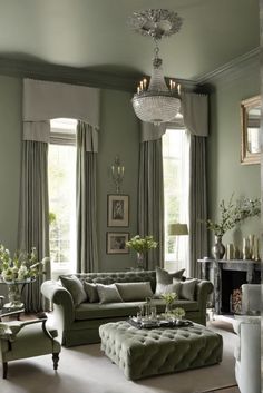 a living room filled with lots of furniture next to a window covered in drapes