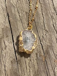 "Stunning gold plated sliced druzy pendant necklace on tarnish resistant 18k Gold Plated Chain. The best part about this necklace is that it is one-of-a-kind, no two druzy pendants are the same! If you're looking for a unique gift for either yourself or someone else this is it!  Please choose chain length and chain style upon checkout (pendant will add an additional .5\" in length). Care Instructions: remove necklace when showering, swimming or working out.  Store it in the packaging it comes in Gold Geodes With Natural Stones As Gift, Elegant Gold Geodes For Gift, Elegant Gold Geodes With Natural Stones, Gemstone Stud Earrings, Gemstone Studs, Newport Beach, Turquoise Gemstone, Gold Plated Chains, Gold Style