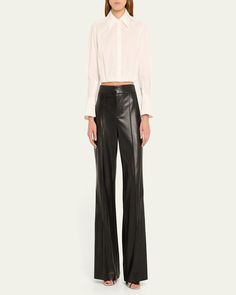 Alice + Olivia "Dylan" pants in fauxleather (polyurethane/polyester)    Approx. 32.25" inseam; 11" rise    High rise    Pintucked front    Back welt pockets    Wide legs    Full length    Hook/zip fly    Lining: Polyester    Dry clean    Imported Sleek Wide-leg Leather Pants For Fall, Sleek Wide Leg Leather Pants For Spring, Fitted Leather Wide-leg Pants, Fitted Faux Leather Classic Bottoms, High-waisted Leather Pants For Business Casual, Classic Fitted Faux Leather Bottoms, Modern Fitted Wide Leg Leather Pants, Sleek Fitted Leather Pants For Business Casual, Fitted Faux Leather Bottoms In Modern Style