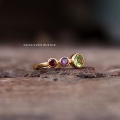 Amethyst, Garnet & Peridot Ring, 18k Gold Vermeil 925 Sterling Silver Ring, Women Handmade Ring, Stacking Ring, Minimal Ring, Gift For Women Metal: 925 Sterling Silver Gemstone : 1) Natural Amethyst                       2) Natural Garnet                       3) Natural Peridot  Stone Color : 1) Purple                          2) Red                          3) Green Stone Shape : Round Stone Setting: Bezel Makes a Wonderful Gift for your Girlfriend, Wife, Mom or Simply an Excellent Addition to Yellow Gold Multi-stone Amethyst Ring Gift, 14k Gold Multi-stone Amethyst Ring, Yellow Gold Multi-stone Amethyst Ring, Peridot Birthstone Ring With Bezel Setting As Gift, Anniversary Multi-stone Peridot Gemstones, Gold Sterling Silver Multi-stone Emerald Ring, Hallmarked Peridot Birthstone Ring, Amethyst Multi-stone Ring Gift, Gold Multi-stone Amethyst Ring