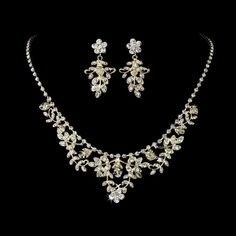 Crystal Floral Wedding Jewelry Set Add a regal look to your bridal accessories with this beautiful jewelry set. This necklace and drop earring set features a silver plated floral design accented with sparkling crystal beads and rhinestones. The perfect jewelry choice for any theme wedding or for your quinceanera or prom! Size; The necklace is 16" long with a 3" extender and lobster claw clasp. The pierced earrings are 1 1/2" long. Color; Silver. Style: ne7207. The model is also wearing wedding t Prom Jewelry Sets, Crystal Wedding Jewelry, Wedding Jewelry Set, Crystal Jewelry Sets, Bridal Fashion Jewelry, Prom Jewelry, Floral Jewelry, Bridesmaid Jewelry Sets, Swarovski Necklace