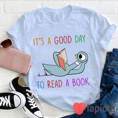 ✔️ TITTLE : It's A Good Day To Read A Book Teacher 2 T-Shirt, Book Shirt, Funny Chicken Shirt, Reading Book Shirt, Kindergarten Shirt, Teacher Shirt ✔️ IMPORTANT: Both Men and Women can we our shirts because this is unisex style t-shirts; Wash item inside out in cold water, do not bleach, do not dry clean, do not iron directly on the design. ✔️ MATERIAL DETAILS: 5.3-ounce, 100% cotton (99/1 cotton/poly (Ash) & 90/10 cotton/poly (Sport Grey); Heavyweight classic unisex tee; Taped neck and shoulde Positive Tees, Teachers Lounge, Chicken Shirt, Teaching Outfits, Book Shirt, Kindergarten Shirts, Classroom Art, It's A Good Day, Chicken Shirts