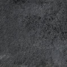 an image of a black textured surface that looks like it could be used as a background