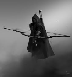 a black and white photo of a person holding two arrows