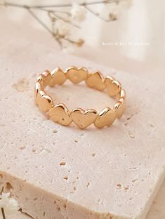 Fall in love again with the delicate and discreet "VALENTINE" ring, 18K gold plated that will stay with you forever. ♡ Features ♡ - Available sizes from 50 to 60FR - 18K gold plated with 5 microns - Elegant Packaging: Ready to give or to keep. - Timeless: Perfect for all occasions, a true ode to nature and the sea. ♡ Shipping Time ♡ Your order will be carefully prepared and shipped within 1 to 3 days. ✉️ Tracked Letter: By default, items are shipped via tracked letter, allowing you to precisely Gold Heart-shaped Stackable Midi Rings, Gold Stackable Heart Midi Rings, Delicate Gold Heart Midi Rings, Dainty Gold Midi Rings For Valentine's Day, Gold Stackable Heart Ring For Valentine's Day, Gold Stackable Rings With Heart Charm For Wedding, Delicate Gold Stackable Rings For Valentine's Day, Delicate Gold Midi Rings For Valentine's Day, Delicate Gold Heart Ring For Valentine's Day