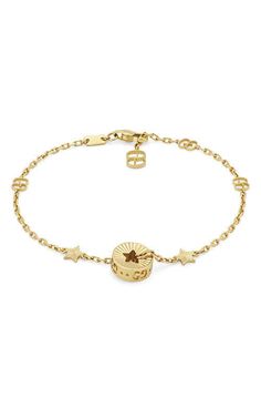 GUCCI Icon 18kt Star Bracelet Yellow Gold YBA729370001.This precious bracelet is presented in 18k yellow gold with a delicate chain featuring the GG motif. The piece's focal point is a circular charm featuring a cut-out star, that recalls the Gucci Cosmogonie fashion show. Taking place beneat... Gucci Cosmogonie, Diamond Accessories, Cushion Diamond, Gold Diamond Necklace, Star Bracelet, Delicate Chain, Princess Diamond, Oval Cut Diamond, Womens Wedding Bands