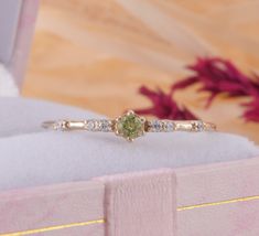 Small & dainty peridot promise ring for her, Womens minimalist yellow gold ring, Delicate promise ring, Unique womens gold peridot ring WE OFFER UNLIMITED PERIOD INSTALLMENTS PLAN This is a beautiful, stunning, feminine ring that works well for all occasions, styles, and ages. You will love it! Ring information: Main stone: Peridot Approximate size: 2.5mm Accent stones: Cubic zirconia Approximate size: 1.25mm (6 stones) Metal type: Gold Metal stamp: 14k Gold Installment Payments We offer ins Gold Peridot Ring, Twig Wedding Band, Promise Ring For Her, Art Deco Wedding Band, Gold Promise Rings, Tiny Rings, Fancy Gifts, Promise Rings For Her, Peridot Ring