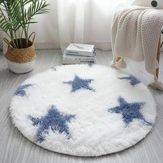 a white rug with blue stars on it