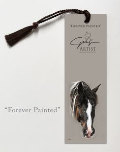 a bookmark with a horse's head on it and the words forever painted