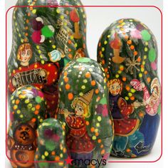 three colorful nesting dolls sitting next to each other