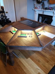 a wooden table with some lights on it