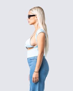 Even in the summer heat, you will be the hottest thing with this baby blue cropped to😏 Features an exposed cut-out front, and triangle bra inserts for an alluring and exciting twist on a timeless piece 💙 Summer Low-cut Crop Top With Built-in Bra, Trendy Triangle Crop Top With Built-in Bra, Spring Low-cut Crop Top, Low-cut Crop Top With Built-in Bra For Night Out, Triangle Top Crop Top For Night Out In Summer, Triangle Crop Top For Summer Night Out, Summer Triangle Top Crop For Night Out, Triangle Top Crop Top For Summer Nights Out, Low-cut Crop Top For Night Out In Spring