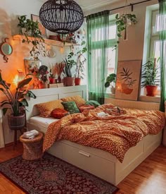 a bed room with a neatly made bed and lots of plants