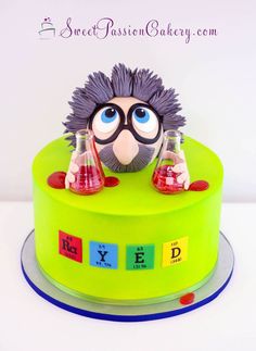 a cake decorated with an image of a hedgehog holding beaks and flasks