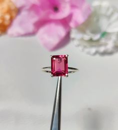 Pink Tourmaline Solitaire Ring * Silver Emerald Cut Gemstone Ring * October Birthstone Ring * Handcrafted Women's Ring * Tourmaline Stackable Ring  Material :- Silver (925 Solid Sterling Silver ) Gemstone : - Lab Grown Tourmaline Item Weight :- Approx. 2 gram Stone Size :- 7 X 9 MM Stone Shape :- Emerald Cut Select Size in Variation , if you don't find perfect size please buy any size and message us your size we'll make Payment Policy We accept payment through PayPal. All payments must be made w Pink Sterling Silver Crystal Ring With Gem, Pink Emerald Cut Sterling Silver Ring, Tourmaline Birthstone Ring Gift, Pink Tourmaline Jewelry With Accent Stones, Pink Round Tourmaline Jewelry, Pink Tourmaline Jewelry With Prong Setting, Pink Topaz Ring With Accent Stones In Sterling Silver, Pink Topaz Ring In Sterling Silver With Prong Setting, Pink Emerald-cut Tourmaline Jewelry