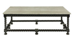 a coffee table with an iron frame and wood top, on wheels in front of a white background