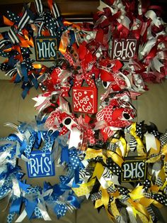 several different colored bows are arranged on a couch with the word hss in them