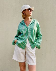 Unique Ralph Lauren long sleeve buttons down shirt in stunning green color with blue -white stripes . Unisex timeless shirt perfect for spring-summer days, made of 100% cotton.  Condition : In good vintage condition. Size: M Label: Ralph Lauren Material: 100% cotton. Measurements taken lying flat: Shoulders: 46 cm/18" Pit to Pit: 58.5 cm/23" Sleeves: 63.5 cm/25" Length: 68 cm/26.7" For more information feel free to contact me. Summer Long Sleeve Blouse With Vertical Stripes, Long Sleeve Blouse With Vertical Stripes For Summer, Green Shirt With Striped Collar For Summer, Green Cotton Shirt With Striped Collar, Spring Green Shirt With Vertical Stripes, Green Vertical Stripes Shirt For Spring, Green Vertical Striped Shirt For Summer, Green Relaxed Fit Long Sleeve Shirt, Green Long Sleeve Shirt With Relaxed Fit