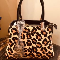 Nwt Dune Leopard Animal Print Handbag Purse Tote Perfect. Animal Print Footed, Patent Handles. Dune Hang Tag And Dune London Badge. Gold Accents At Sides And Zipper. Comes With Dust Bag. Leopard Print Shoulder Bag For Everyday Use, Leopard Print Bags For Daily Use, Leopard Print Bag For Daily Use, Top Handle Bags In Leopard Print, Leopard Print Everyday Bags With Handles, Chic Leopard Print Bags For Errands, Chic Double Handle Bag In Leopard Print, Leopard Print Top Handle Bag For Travel, Leopard Print Top Handle Shoulder Bag For Shopping