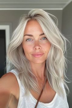 Don't miss these must-try silver-blonde haircuts for an amazing look in 2024. Each style is designed to keep you looking fashionable and modern. Click the link to see all the incredible hair inspirations! Grey Hair Modern, Blonde Hair With Grey Highlights, Ashy Blonde Hair, Haircut Gray Hair, Blonde Hair Goals, Ice Blonde Hair, Bright Blonde Hair, Grey Blonde Hair