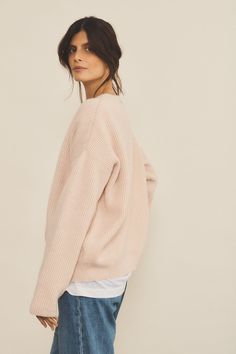 Meet Edward, the 100% ethical cashmere jumper which will bring a new definition to ‘basic’. The perfection of its round neck as well as its English rib and oversized cut give it a sophisticated, elegant yet understated look. Did we mention it is unisex? It will soon become one of your closet essentials; enhance it with a shirt collar, a necklace or a scarf. Charlotte’s fashion tip: ‘I love this design for the rib knitted work that adds a new depth to the cashmere. The oversized cut of the Edward Classic Oversized Ribbed Sweater, Oversized Ribbed Cropped Sweater For Layering, Relaxed Fit Cashmere Sweater With Ribbed Detail, Ribbed Cashmere Sweater In Relaxed Fit, Cashmere Ribbed Sweater With Relaxed Fit, Relaxed Fit Ribbed Cashmere Sweater, Oversized Fine Knit Sweater For Everyday, Classic Oversized Sweater With Ribbed Neckline, Classic Oversized Ribbed Cardigan