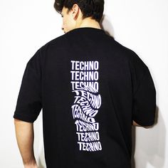 "\"Your Best Rave Partner: Techno Revolution Oversize Black T-shirt'' *Designed for be your favourite and feel special while wearing. Don't get lost in the details, it's already the best. If you have any questions, please contact us on message or e-mail! *Handmade Print *Limited Edition Get ready to groove to the beat with our Rave-Inspired oversize T-shirt. This T-shirt is perfect for electronic music enthusiasts and rave party-goers who want to make a bold statement on the dance floor.  Made f Crew Neck T-shirt With Text Print For Concert, Black Oversized T-shirt For Concert, Oversized Black T-shirt For Concert, Oversized Urban Top For Concert, Black Band Merch Tops With Slogan, Black Slogan Band Merch Tops, Graphic Crew Neck Tops For Concerts, Black Text Print Top For Concert, Oversized Black Band Merch Top