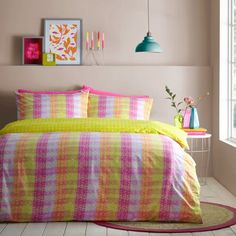 * Includes standard pillowcase(s) * Geometric lines design * Crisp and soft polycotton * Clear button closure * Reversible design * Machine washable Does your bedroom need a new splash of colour? With contemporary geometric lines in bold neon colours, this duvet cover set is perfect for brightening up your bedroom. As you settle down ready for a soothing slumber, the crisp polycotton material is soft to lay under. It is also hard-wearing, making this duvet cover set an investment for night's to come. Striped Duvet Cover, Lime Sorbet, Neon Colours, Lines Design, Striped Duvet, Neon Stripes, Striped Duvet Covers, Reversible Duvet Covers, Duvet Cover Pattern