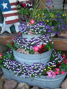 several flower pots are stacked on top of each other