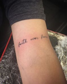 a person with a tattoo on their arm that reads, but the other few things