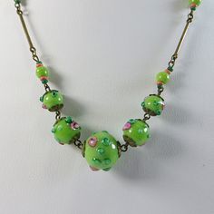 "1930s Apple Green Bohemian Czech Glass Beads Necklace, Pretty Handmade Glass Beads Vintage Necklace Green with Pink Flowers and Leaves ✿☆.*'`♥.*' ✿☆..*'.*' ♥ .*'♥ ✿☆..*' ♥ ✿☆.¸.*'♥.*' ♥ ✿☆.¸¸.*'.¸¸.*'♥.*' ♥ '.*.*'.*' ♥ ✿' ♥ An adorable little vintage glass bead necklace, dating to around the 1930's, of Bohemian glass beads in a womderful vibrant apple green colour, decorated with raised surface details of tiny pink roses and green leaves.   Each of the sections is wired, with long metal spacers Cleaning Silver Jewelry, Murano Glass Jewelry, Handmade Glass Beads, Green Necklace, Glass Bead Necklace, Glass Jewelry, Cleaning Jewelry, Czech Glass Beads, Spring Rings