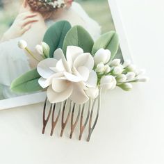 This flower hair comb with еucalyptus leaves and white and ivory flowers is fully handmade. Each element (flower, petal or leaf) is made entirely by hands from material called cold porcelain and toned with soft pastel. These flowers look much like fresh flowers but they will never fade. I use only non-allergic nickel free bases for my items.This flower comb is absolutely unique and perfect to emphasize your natural beauty. Flowers are tender and delicate. It will be perfect for greenery and succ Rustic Wedding Veil, Succulent Hair, Beaded Hair Combs, Southwestern Wedding, White Ranunculus, Floral Hair Pieces, Flower Hair Pieces, Feuille Eucalyptus, Beauty Flowers