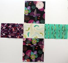 four pieces of fabric laid out on top of each other in different patterns and colors