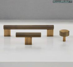 three wooden benches and two stools on a white surface with the words houseofholt