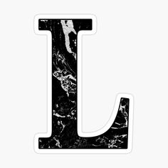 the letter j is made up of black and white marble sticker on a white background