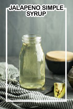 a jar filled with liquid sitting on top of a table