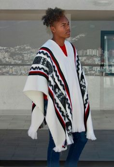 Created from llama wool yarn, this unisex poncho provides lightweight, soft, and warm comfort that won't irritate the skin. One Size: 45 inch x 35 inch (115 x 90 cm) Material: 100% Llama Wool Weight: 900 g Care: Hand Wash Use Mild Detergent Do not Bleach We ship from Ecuador. Sometimes customs may delay the delivery. Casual Alpaca Poncho For Winter, Traditional White Poncho For Fall, Traditional Winter Poncho For Outdoor, Casual Winter Cape For Festivals, Casual Winter Festival Cape, Casual White Poncho Shawl, Casual White Shawl Poncho, Poncho Coat Cape, Llama Llama