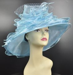 ".  This is a lovely, fancy organza hat. It measures 22.5 inches inside around, one size fits all, should fit every one, hat adjuster is inside statin hatband for extra security or a better fit, organza flower accent has piped edges and layers alternating of organza.   Ruffle slightly and fall, 4\" deep crown. This hat has a medium brim. It's very light and comfortable, perfect for tea party, wedding party, Kentucky Derby part etc. This fashion hat is absolutely gorgeous, this is a perfect hat f Light Blue Mini Hat For Kentucky Derby Party, Blue Cloche Hat For Party, Elegant Light Blue Hats For Spring, Elegant Light Blue Hat For Spring, Light Blue Hat For Kentucky Derby Party, Elegant Light Blue Mini Hat For Kentucky Derby, Light Blue Fitted Hat For Party, Blue High Crown Hat For Party, Elegant Light Blue Hat For Wedding