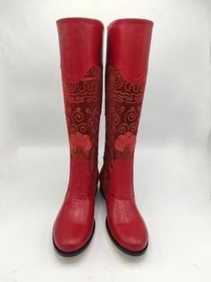 Red Embroidered Boots With Round Toe, Embroidered Red Boots With Round Toe, Traditional Fitted Leather Boots, Bohemian Red Leather Boots, Traditional Hand Tooled Leather Boots, Traditional Handmade Leather Boots, Traditional Embroidered Leather Boots, Traditional Hand-stitched Leather Boots, Suzani Tapestry