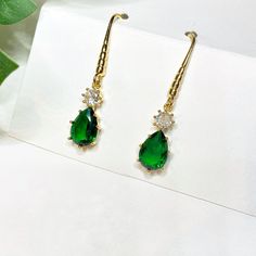 Emerald Green Drop Earrings ♥Dimension: 4 cm approx. Drop : 2 cm approx. Colour : Green | Gold Material type:  Glass Crystal, Copper Gold Plated, Cubic Zirconia ♥ Packaging: Your lovely jewellery will come with a free nice package with my signature in a wax seal. ♥Free Shipping for all UK orders.   ♥Return and exchange: : Please note I do not accept returns on earrings due to hygiene. However exceptions will be made if the earrings are unworn and I'm contacted as soon as your order is received. Emerald Green Earrings, Drop Earrings Gold, Crystal Dangle Earrings, Gift For Her Birthday, Earrings Dainty, Green Earrings, Lovely Jewellery, Wax Seal, Gold Drop Earrings