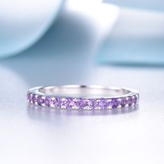 This is an amethyst ring. Stone: *Half eternity 2mm Natural amethyst. Custom Order *The main stone can be other gemstones you can imagine,any birthstone can be made.Please contact me if you need this service. *Any size *I can also design the matching band. Other *Rush order *Engraving *Payment plans *Please feel free to contact me if you need the above service. Processing Time *Handmade jewelry normally needs 2-3 weeks to finish,For some special one it may need 1-2 months. Return Policy 30 days Fine Jewelry Purple Amethyst Ring With Prong Setting, Fine Jewelry Amethyst Halo Ring Gift, Purple Round Cut Birthstone Ring Fine Jewelry, Fine Jewelry Amethyst Ring With Halo For Promise, Fine Jewelry Amethyst Halo Promise Ring, Purple Amethyst Halo Ring For Promise, Purple Round Cut Birthstone Ring, Gift Amethyst Halo Ring, Purple Sapphire Promise Ring In Fine Jewelry