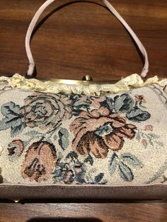 Vintage brocade lace patchwork hand bag purse Vintage styled bag Nice brocade florals with golden threads 6 in x 13 in 18 in wrist strap All shipped free in the US Please check out our THOUSANDS of great reviews Formal Tapestry Bags, Gold Tapestry Rectangular Bag, Victorian Style Rectangular Tapestry Bag, Victorian Style Embroidered Rectangular Bag, Vintage Tapestry Shoulder Bag With Removable Pouch, Vintage Rectangular Fabric Shoulder Bag, Vintage Rectangular Fabric Bag, Vintage Style Bag, Purse Vintage