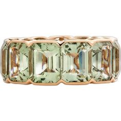 an 18k rose gold ring set with green tourmaline and diamonds, circa 1950