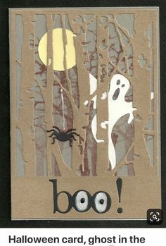 a halloween card with ghost and spider in the woods on it's front side