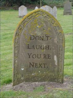 a grave with the words don't laugh, you're next written on it