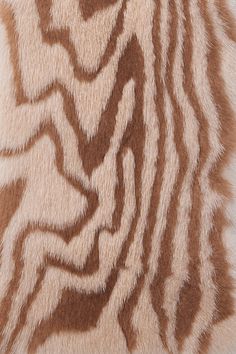 a zebra print fur pattern on the back of a pillow