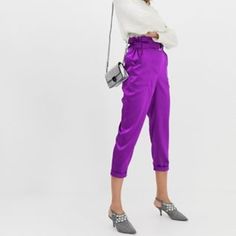 River Island For Asos Tapered Pants With Paperbag Waist In Purple Size 8 Spring Paperbag Waist Pants For Night Out, Paperbag Waist Pants For Night Out In Spring, Chic Purple Pants With Pockets, Trendy Purple Workwear Pants, Trendy Purple Pants For Workwear, Chic Purple Bottoms For Day Out, Trendy Pants With Pockets For Going Out, Chic Purple Bottoms For Work, Chic Purple Workwear Bottoms