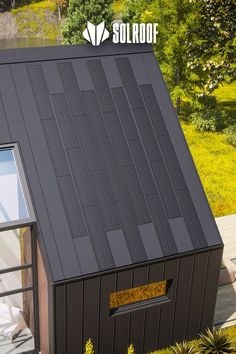 an image of a house that is made out of wood and metal with the words solar roof above it