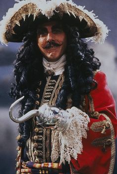 a man dressed in an old fashion costume