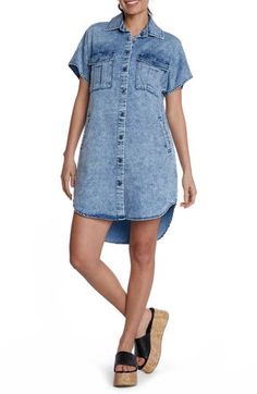 This season-staple denim dress is designed with abbreviated sleeves and a curved high-low hem. Front button closure Spread collar Short sleeves Chest button-flap patch pockets; side pockets 62% lyocell, 20% cotton, 12% polyester, 5% rayon, 1% spandex Machine wash, tumble dry Imported Denim Shirt Dress With Short Sleeves In Medium Wash, Summer Washed Button-up Shirt Dress, Summer Denim Washed Shirt Dress, Spring Washed Denim Shirt Dress, Summer Chambray Button-up Shirt Dress, Short Sleeve Denim Dress With Button Closure For Daywear, Washed Denim Shirt Dress, Casual Denim Knee-length Shirt Dress, Casual Shirt Dress With Shirttail Hem And Buttons